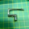 Imagen del Looper Collarin Kansay Special - 19-539, pieza robusta que fija y alinea partes en máquinas industriales para asegurar una producción estable y de alta calidad.
