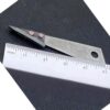 Cuchilla fija de tungsteno B24 para cortadora de tela RC‑70 de 2.5 pulgadas. Repuesto metálico de alta precisión y durabilidad, usado en confección textil profesional.