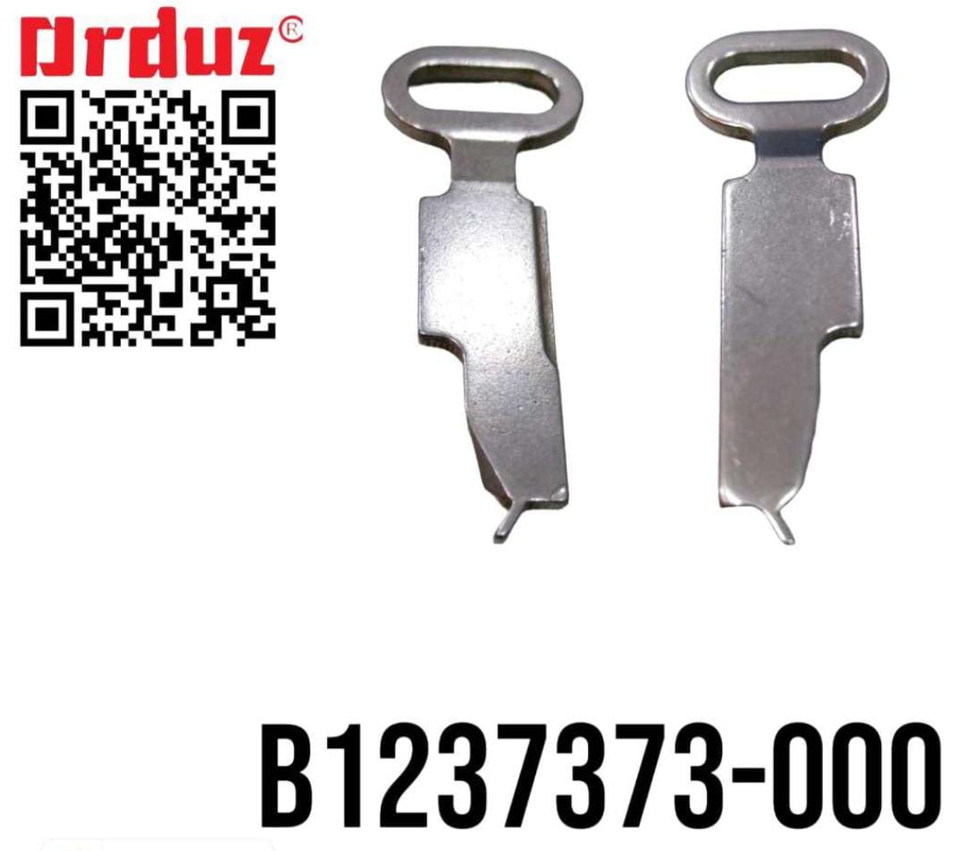 Retenedor Botonadora B1237-373-000 para máquina de coser industrial utilizado en la sujeción precisa de botones durante procesos de confección textil.